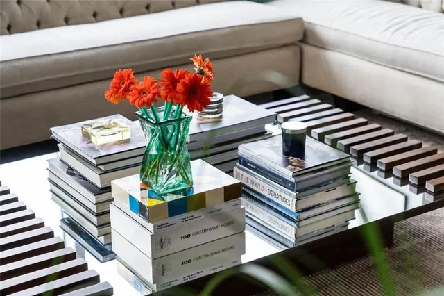 a view of a living room with furniture and a window