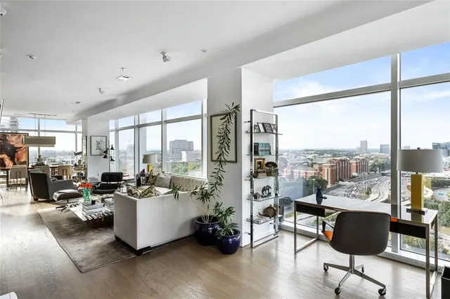 a view of a balcony with a floor to ceiling window