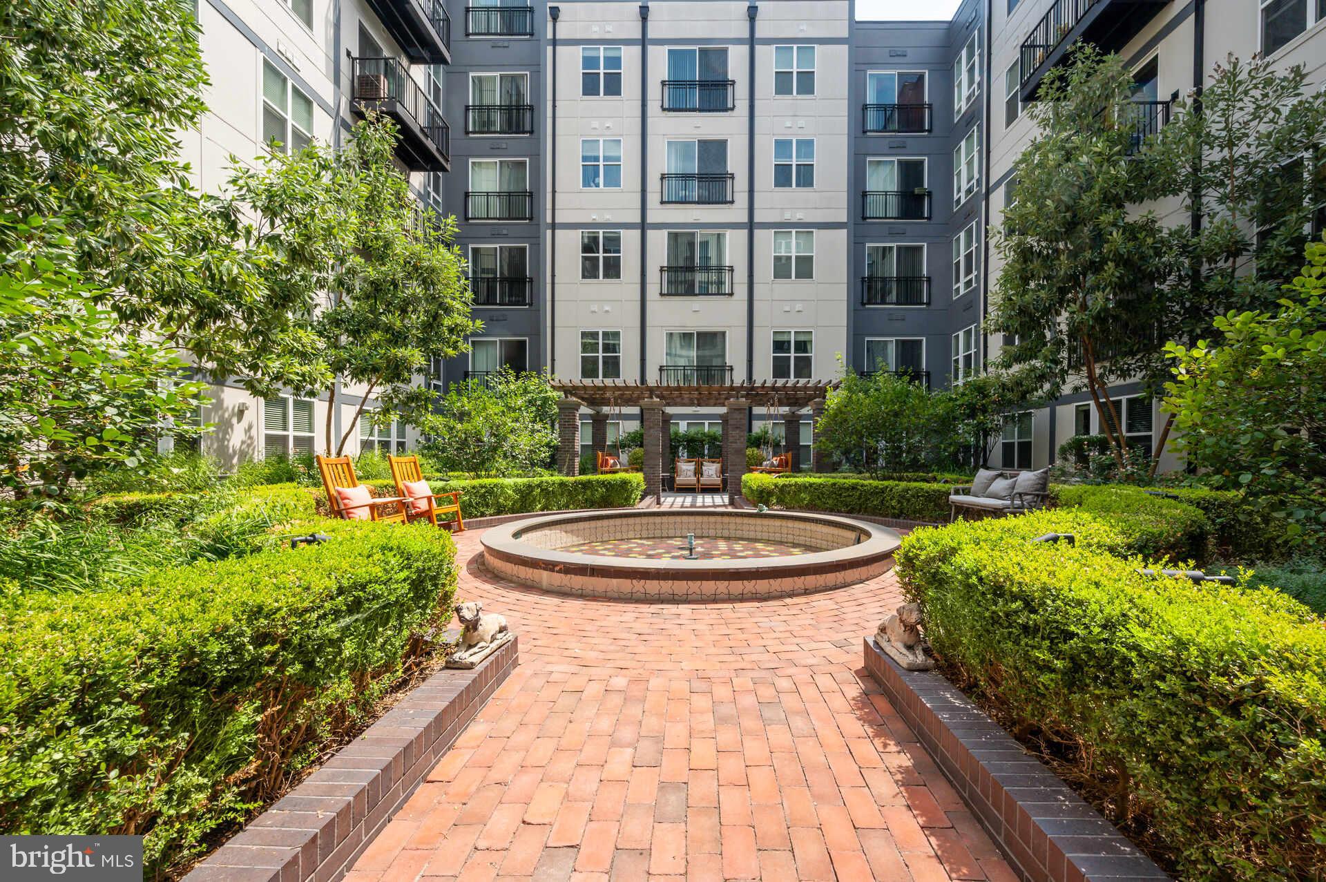 1339 E Street Southeast, Unit 9 Washington, DC 20003 - Photo 3 of 35 a view of a fountain in front of a building