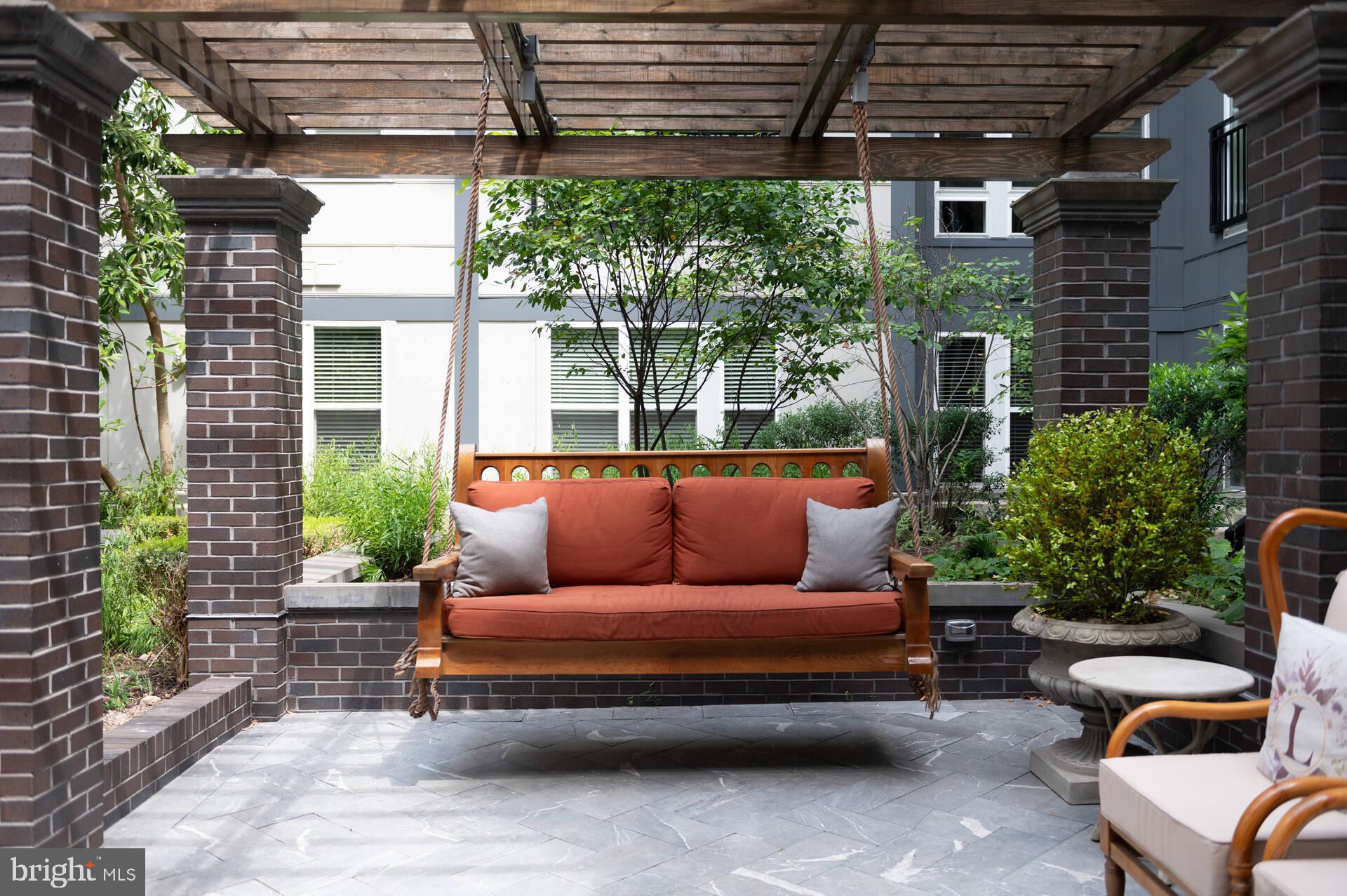 1339 E Street Southeast, Unit 9 Washington, DC 20003 - Photo 31 of 35 a outdoor living space with furniture and a garden