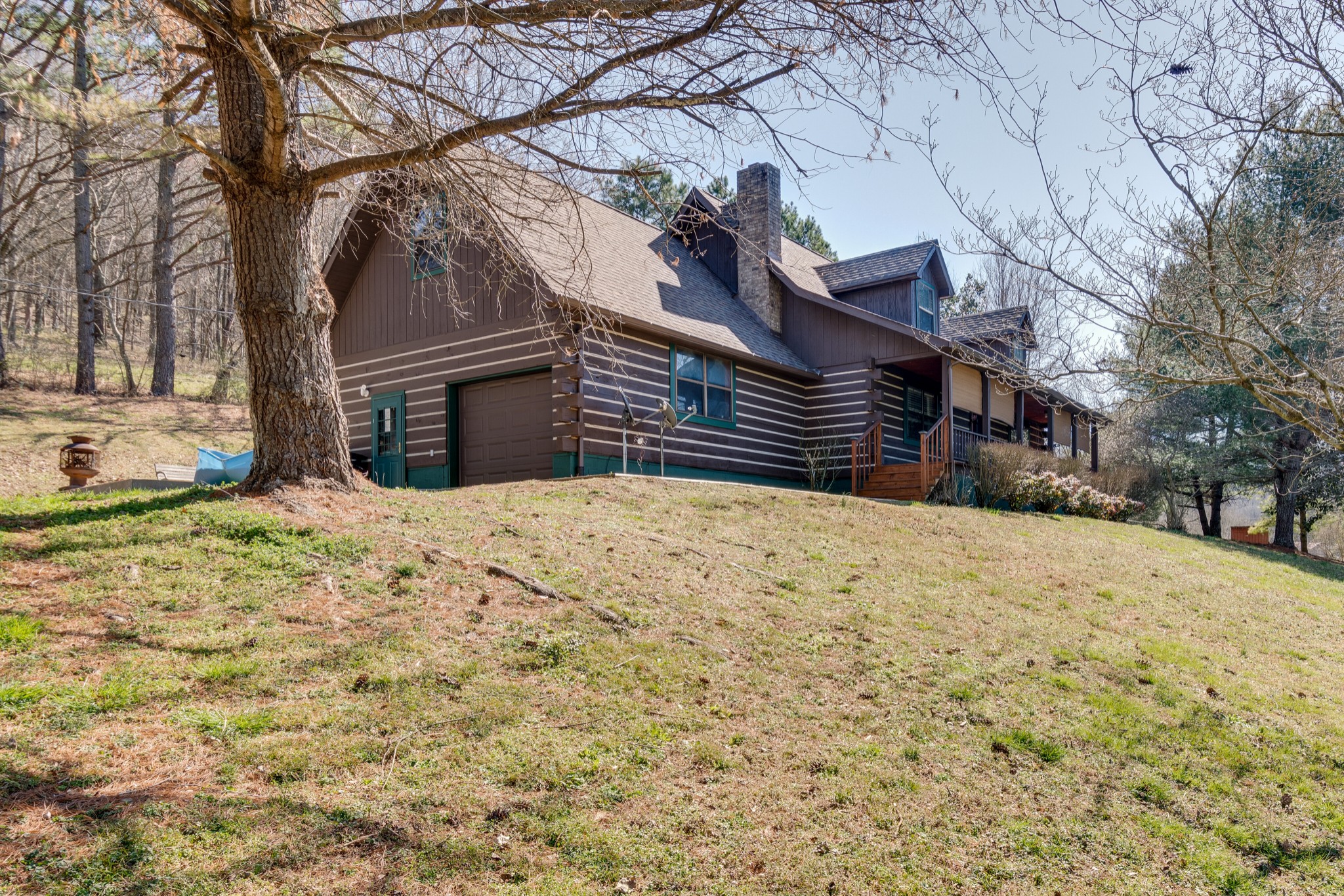 324 Shorts Road Pulaski, TN 38478 - Photo 3 of 40 a view of a backyard with a large tree