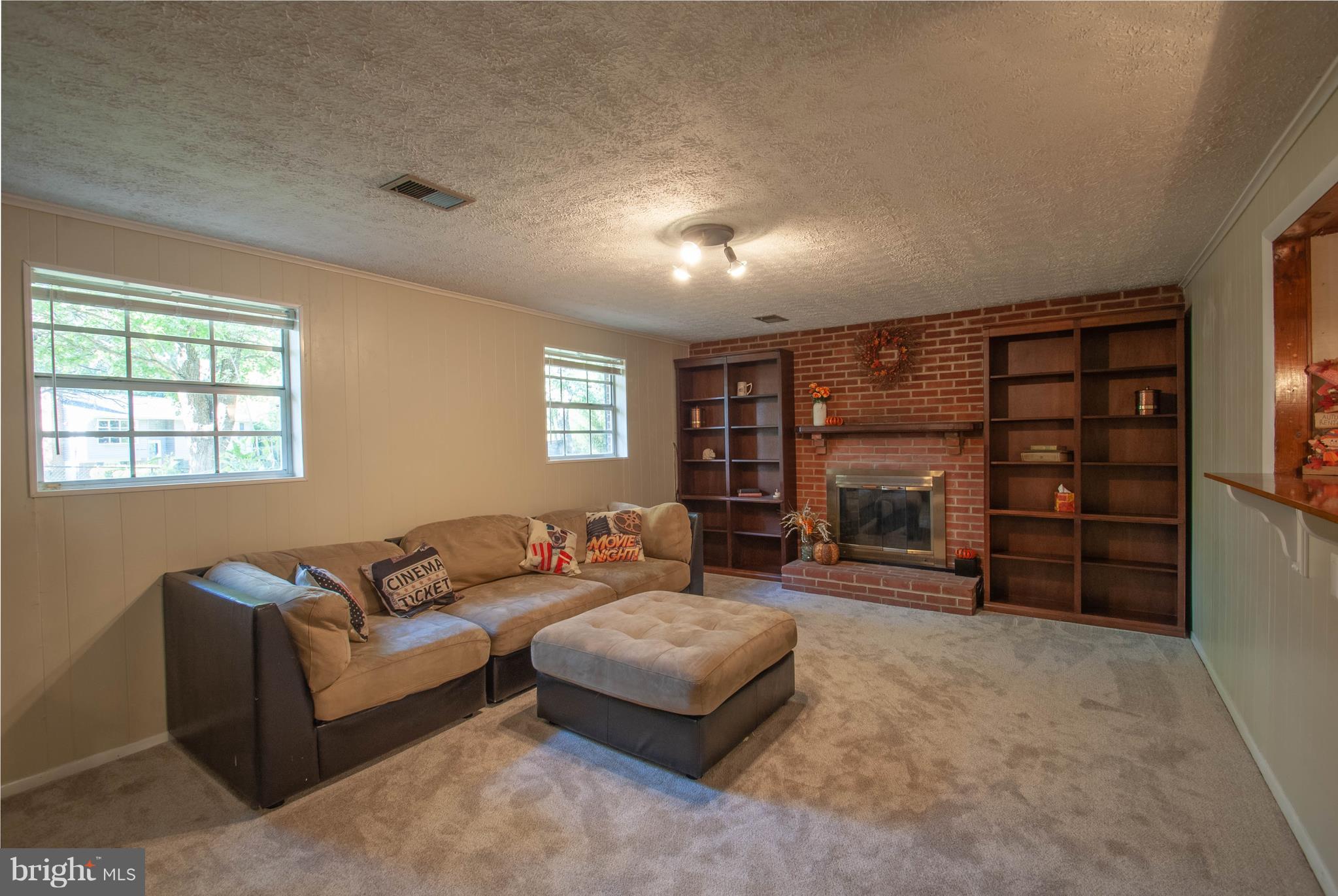 3003 Marlin Drive Riva, MD 21140 - Photo 2 of 36 a living room with furniture and a fireplace
