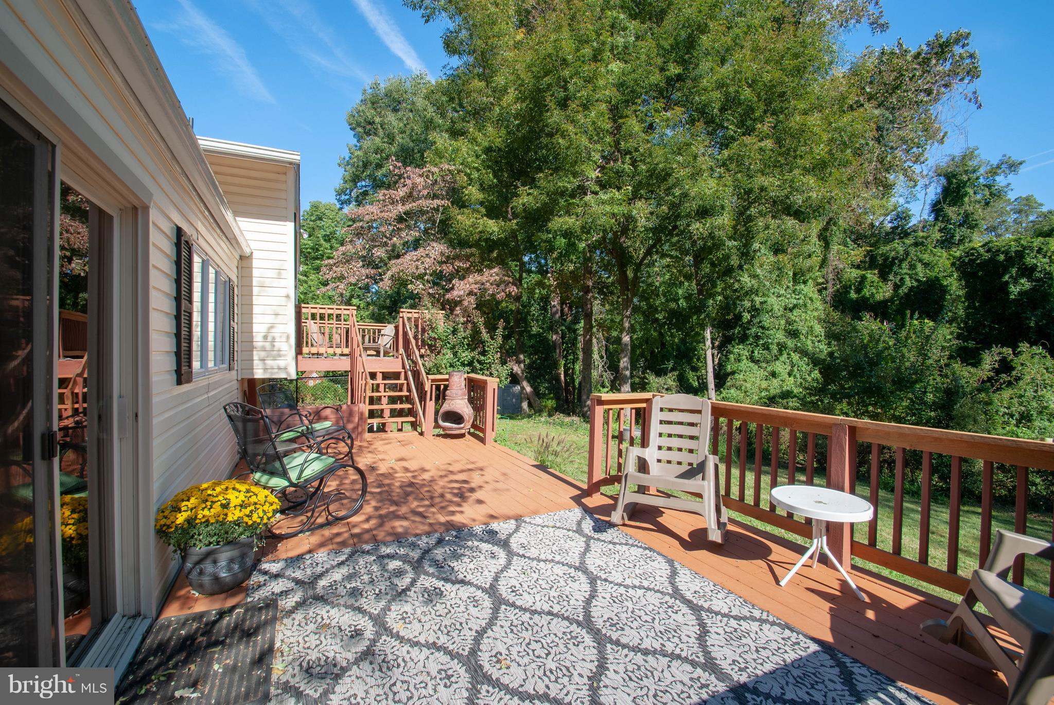 3003 Marlin Drive Riva, MD 21140 - Photo 12 of 36 a balcony with chairs and with potted plants