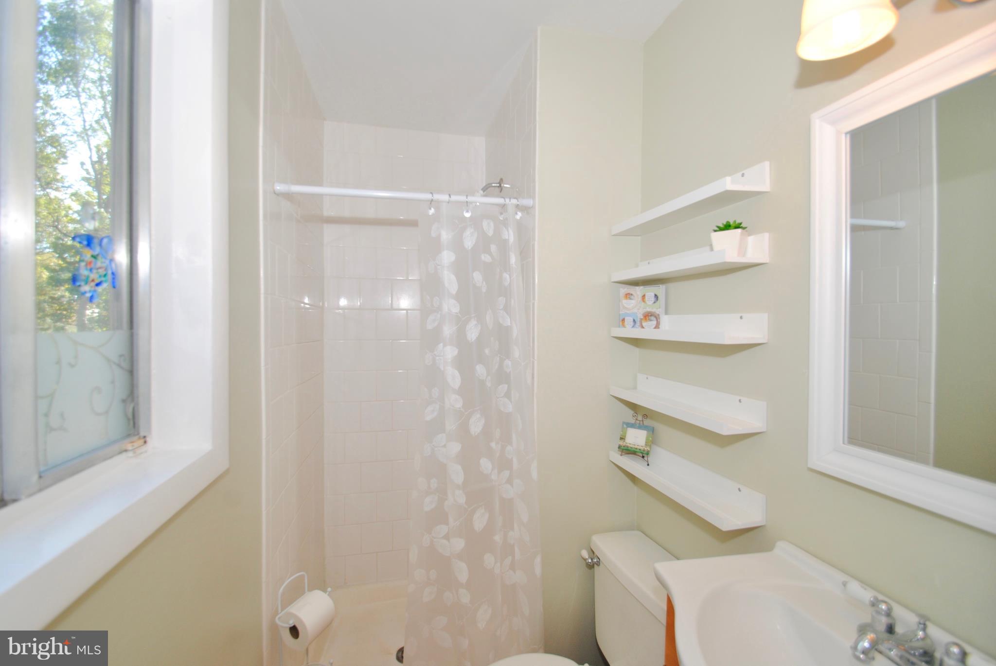 3003 Marlin Drive Riva, MD 21140 - Photo 24 of 36 a bathroom with a shower
