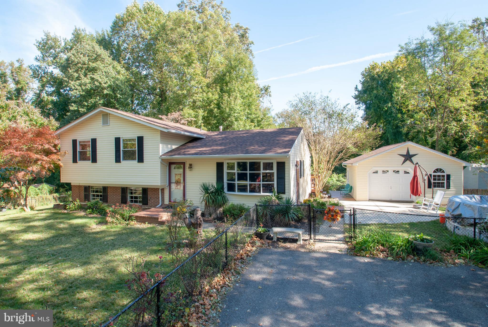 3003 Marlin Drive Riva, MD 21140 - Photo 31 of 36 a front view of a house with garden