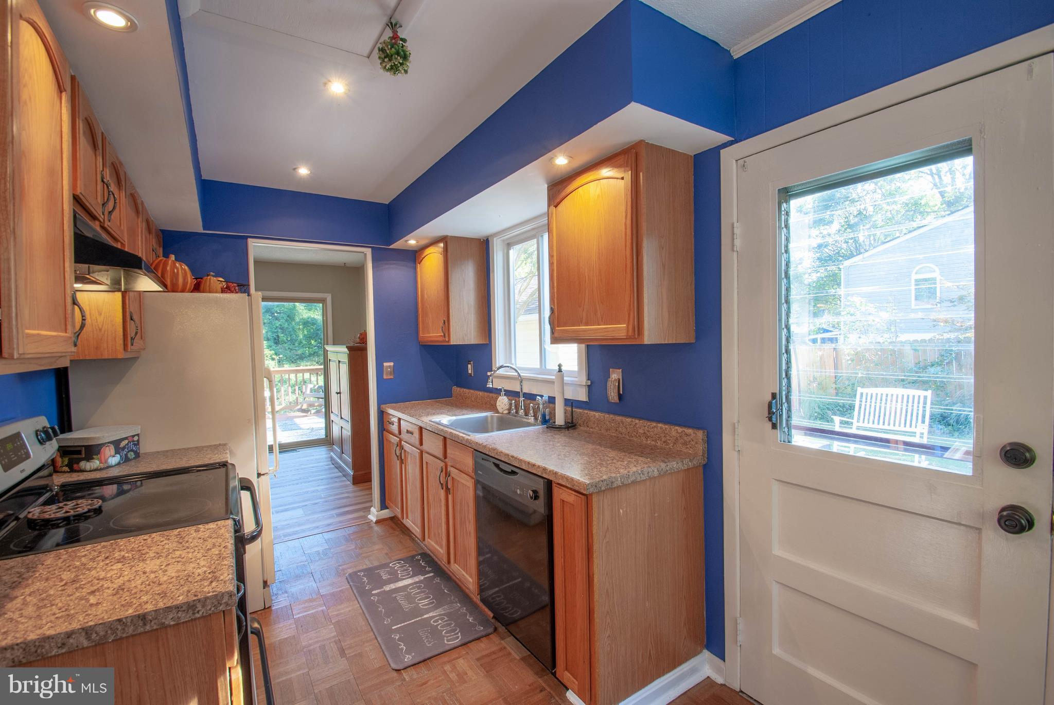 3003 Marlin Drive Riva, MD 21140 - Photo 7 of 36 a kitchen with a stove a sink and a refrigerator