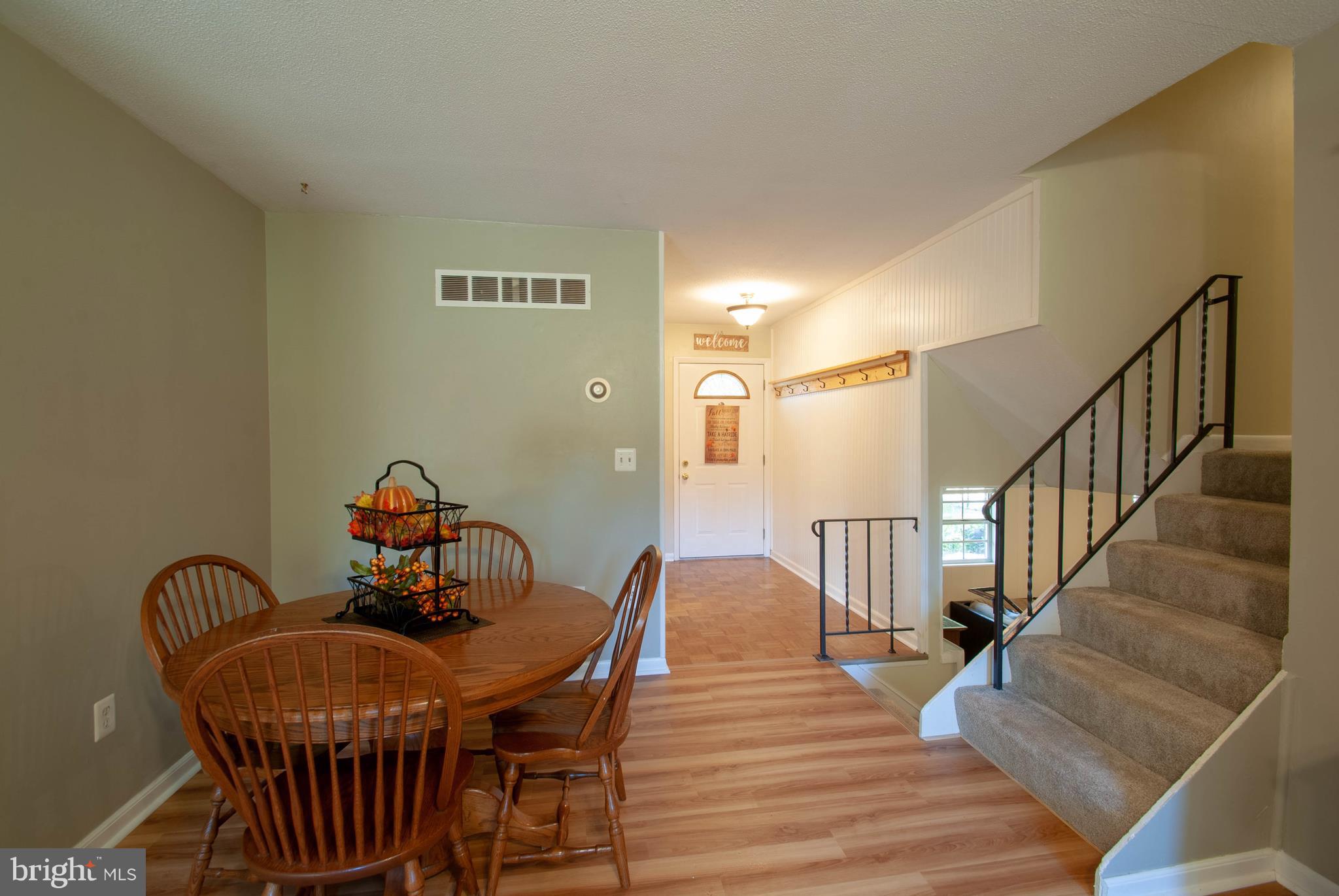 3003 Marlin Drive Riva, MD 21140 - Photo 9 of 36 a view of a dining room with furniture and wooden floor