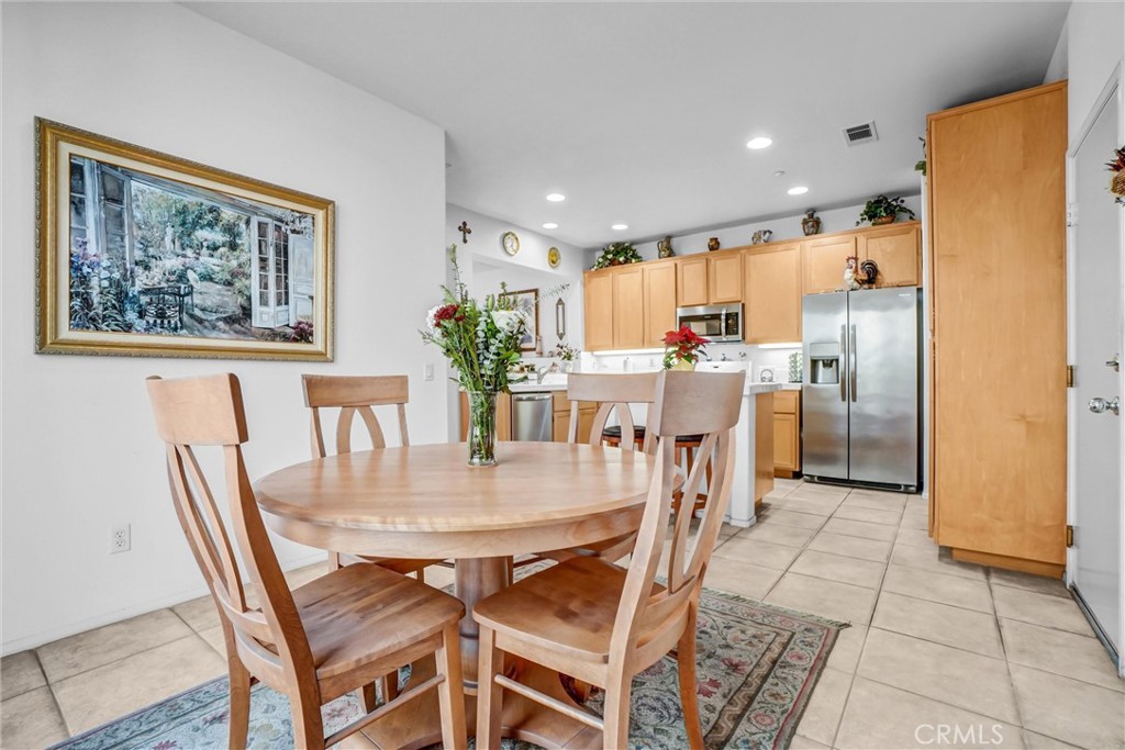 65 Windward Way Buena Park, CA 90621 - Photo 13 of 50 a view of a dining room with furniture