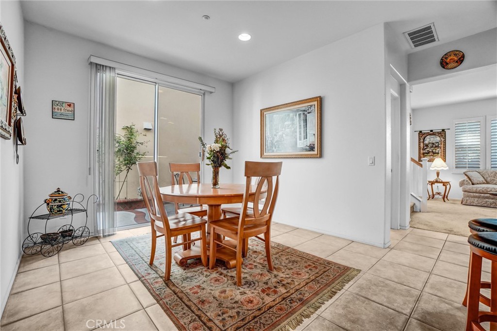 65 Windward Way Buena Park, CA 90621 - Photo 14 of 50 a dining room with furniture and window