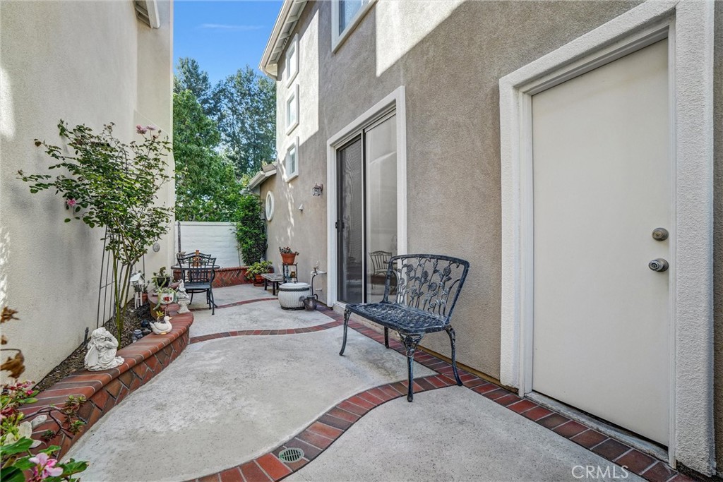 65 Windward Way Buena Park, CA 90621 - Photo 19 of 50 a view of a backyard with sitting area and furniture