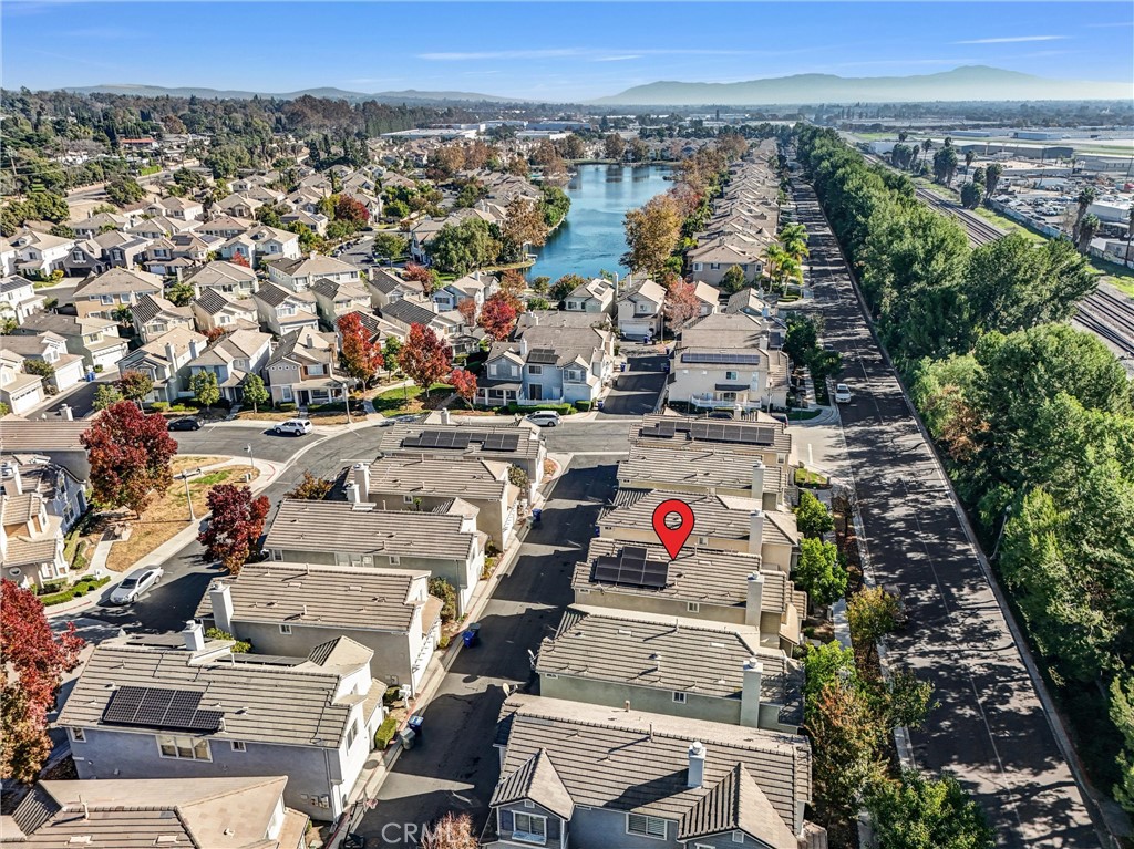 65 Windward Way Buena Park, CA 90621 - Photo 42 of 50 an aerial view of residential houses with outdoor space