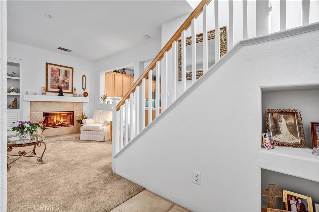 65 Windward Way Buena Park, CA 90621 - Photo 5 of 50 a view of livingroom with furniture and fireplace