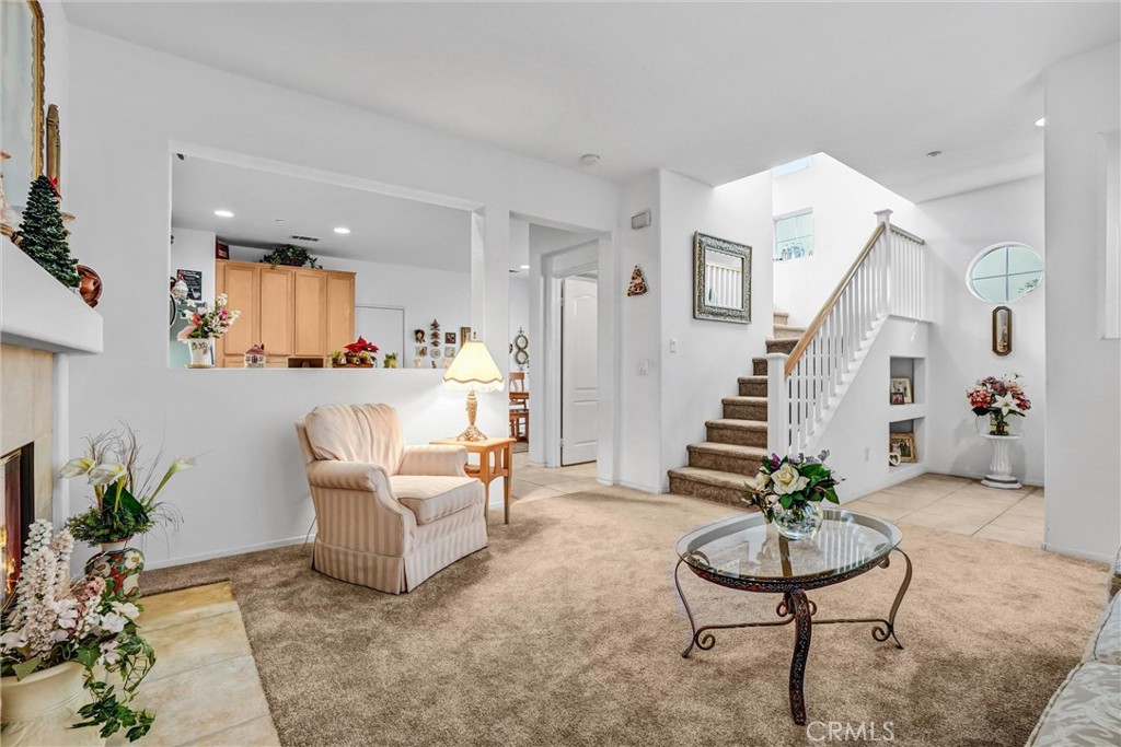 65 Windward Way Buena Park, CA 90621 - Photo 8 of 50 a living room with furniture and a potted plant
