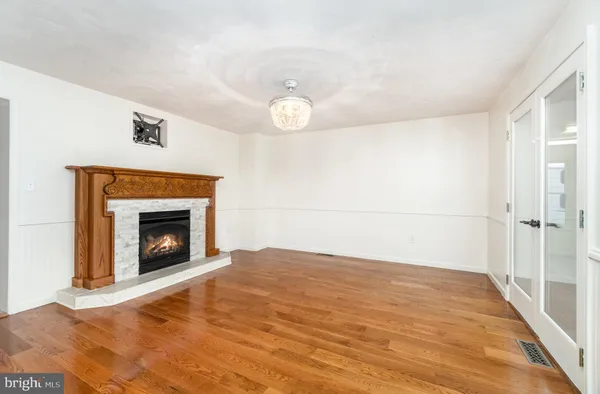 a view of a livingroom with wooden floor