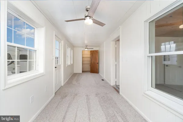 a view of a room that has a window in it