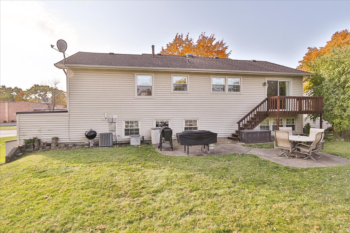 760 Checker Drive Buffalo Grove, IL 60089 - Photo 29 of 29 a view of a house with backyard porch and sitting area