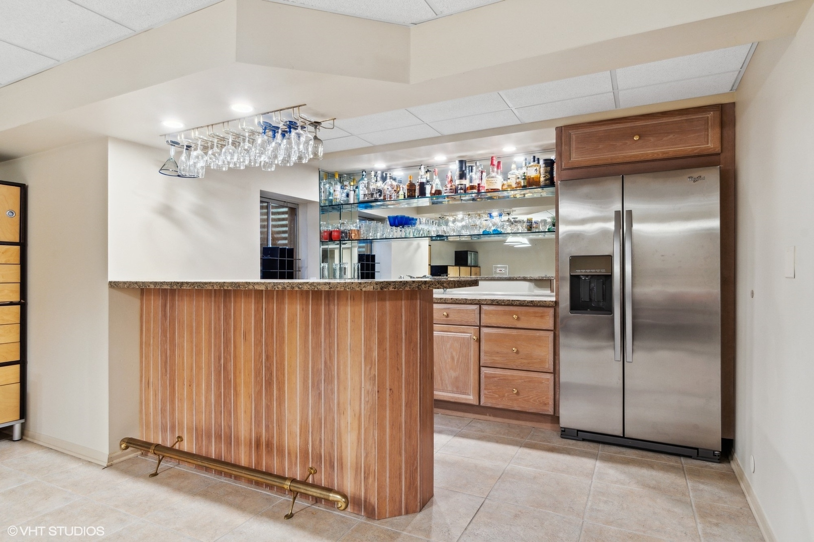 1049 Mar Ln Drive Lake Forest, IL 60045 - Photo 22 of 25 a kitchen with kitchen island a counter top space cabinets and stainless steel appliances