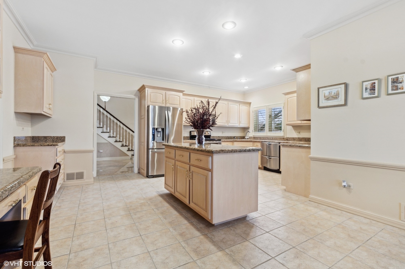1049 Mar Ln Drive Lake Forest, IL 60045 - Photo 10 of 25 a kitchen with white cabinets and appliances