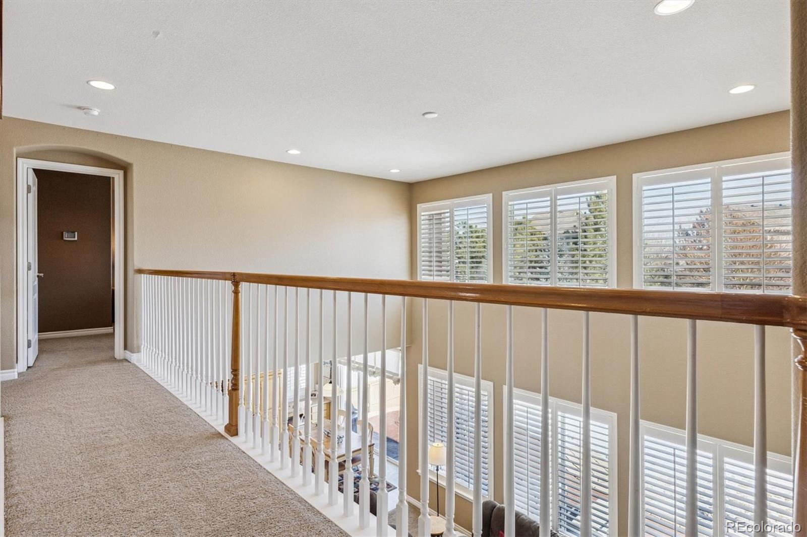 10822 Glengate Circle Highlands Ranch, CO 80130 - Photo 15 of 47 a view of a room with windows