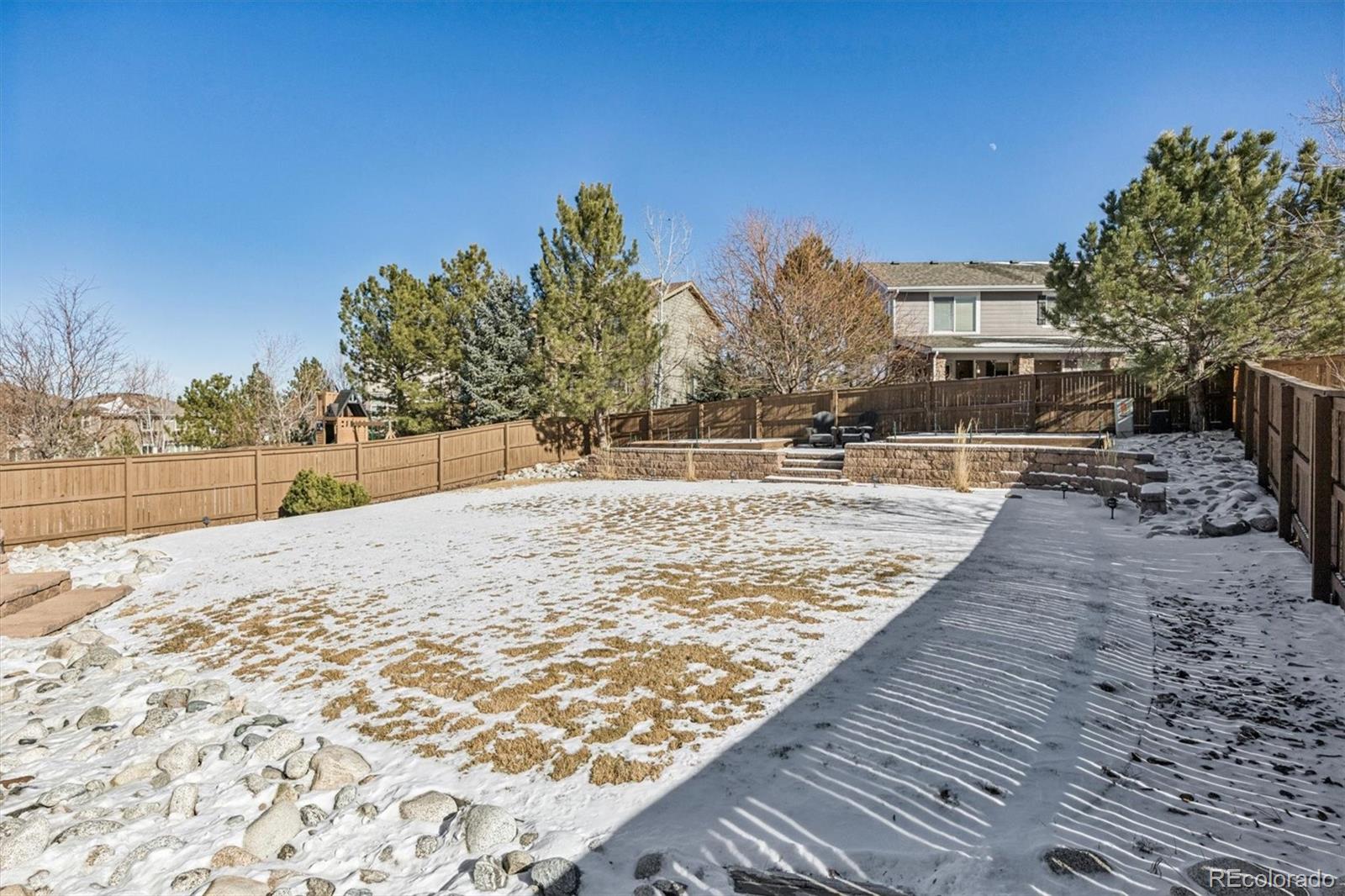 10822 Glengate Circle Highlands Ranch, CO 80130 - Photo 39 of 47 a view of a backyard of the house