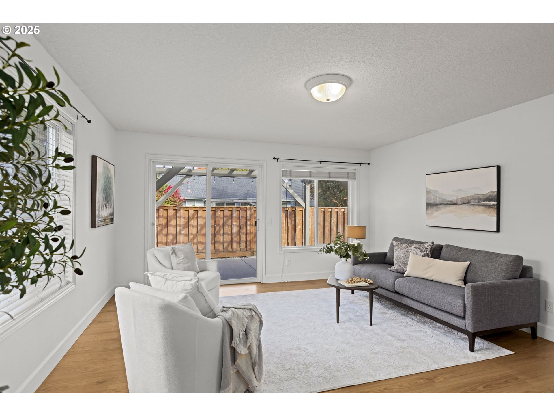 22271 Northeast Lachenview Lane Fairview, OR 97024 - Photo 14 of 40 a living room with furniture and a large window