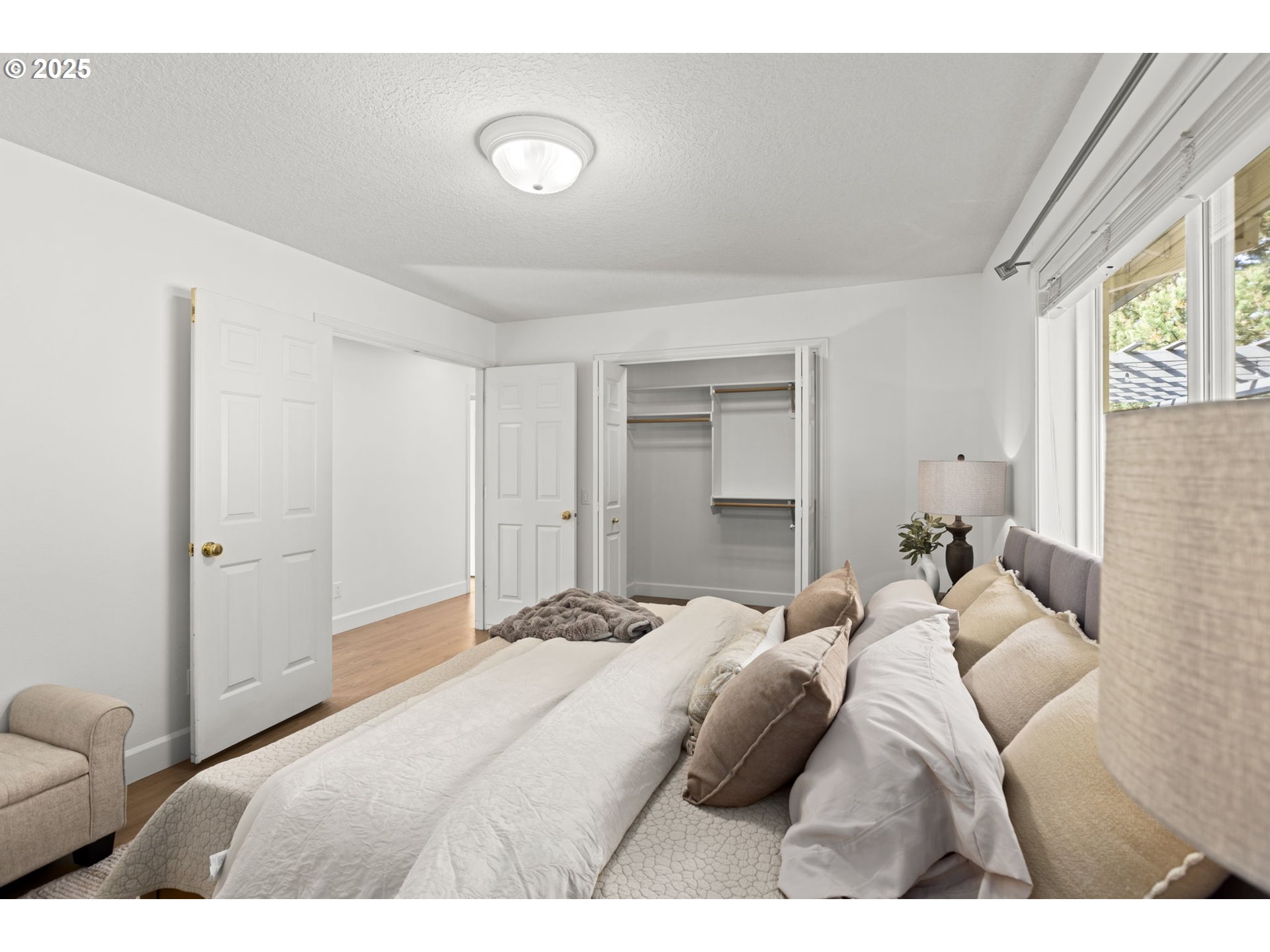 22271 Northeast Lachenview Lane Fairview, OR 97024 - Photo 19 of 40 a bedroom with a bed and a couch