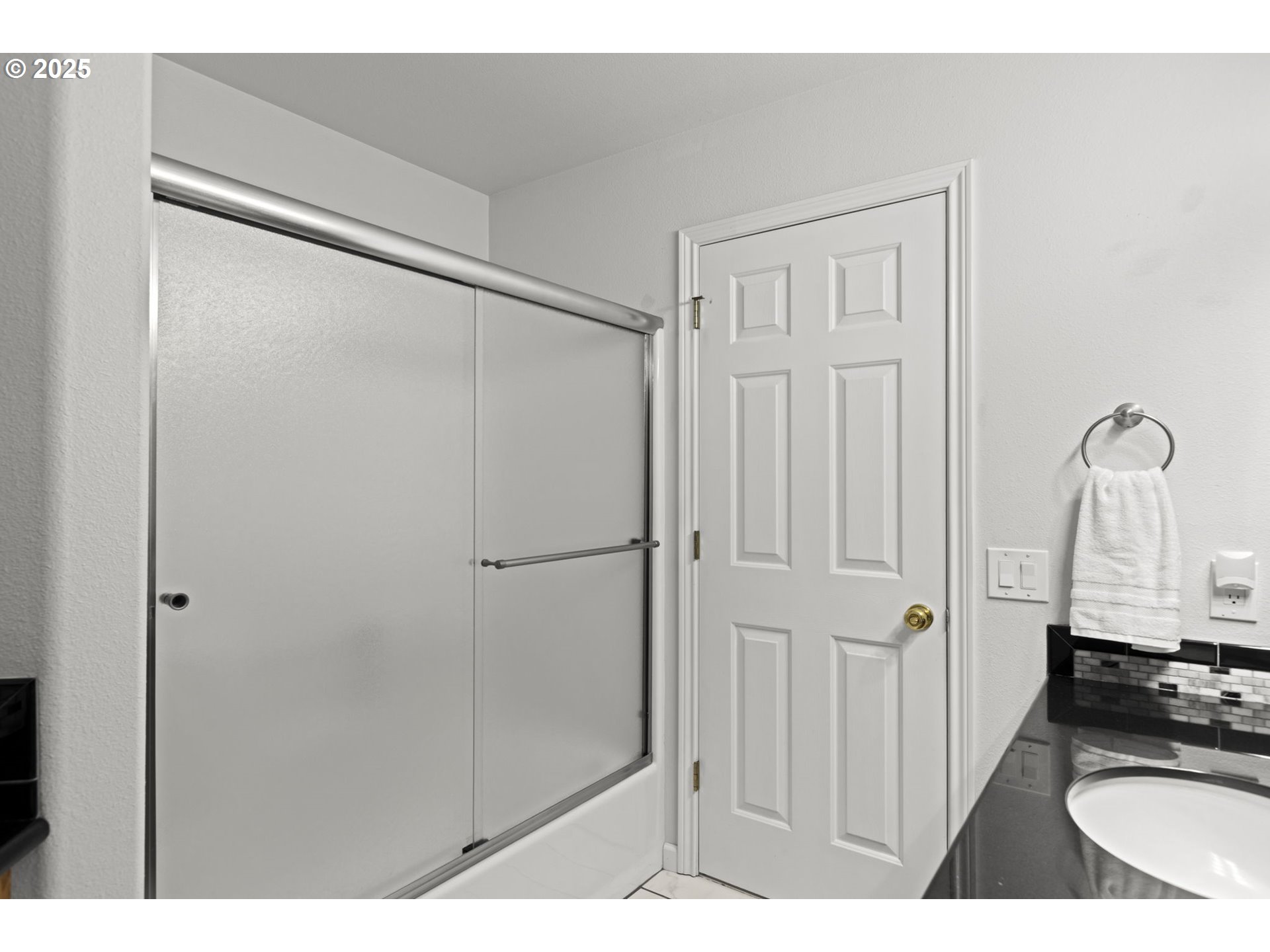 22271 Northeast Lachenview Lane Fairview, OR 97024 - Photo 26 of 40 a bathroom with a granite countertop sink a mirror and shower
