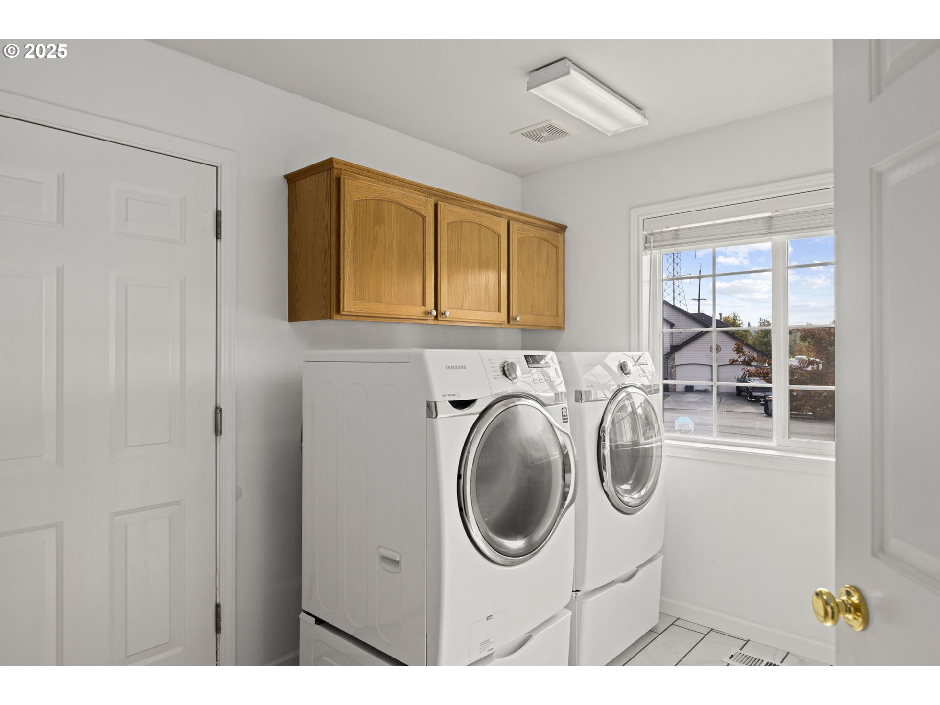 22271 Northeast Lachenview Lane Fairview, OR 97024 - Photo 27 of 40 a utility room with dryer and washer