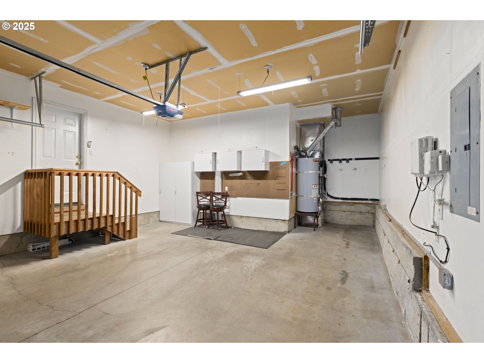 22271 Northeast Lachenview Lane Fairview, OR 97024 - Photo 29 of 40 a view of a livingroom with furniture and a staircase
