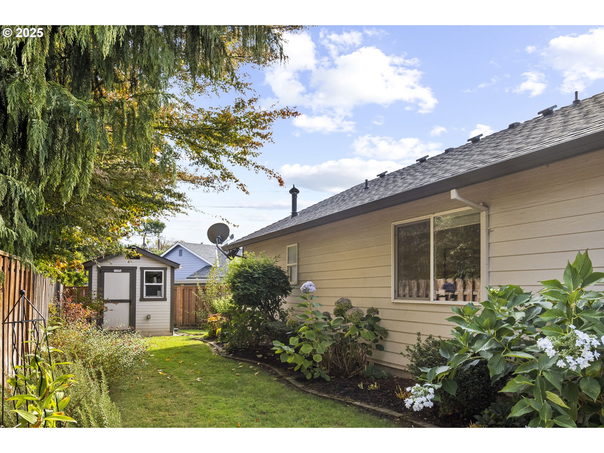 22271 Northeast Lachenview Lane Fairview, OR 97024 - Photo 32 of 40 a front view of a house with garden
