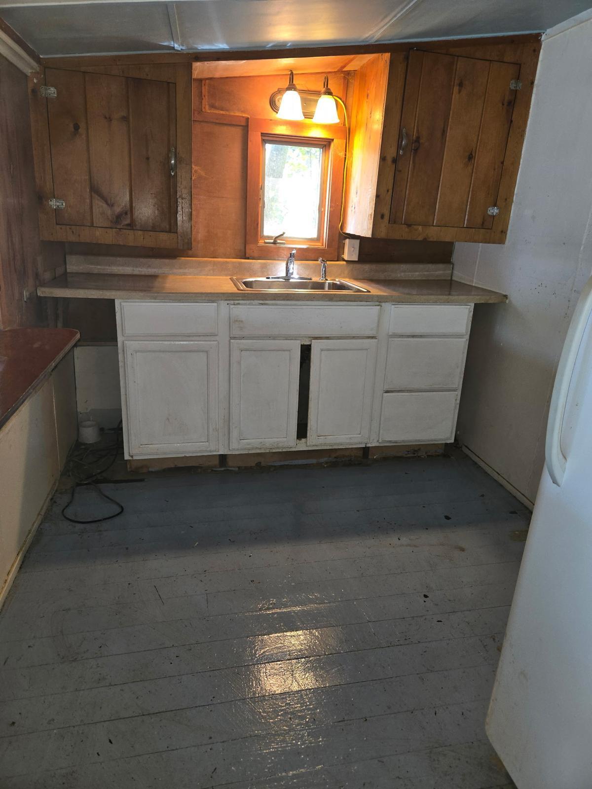 656 W Road Portage Lake, ME 04768 - Photo 17 of 24 Kitchen