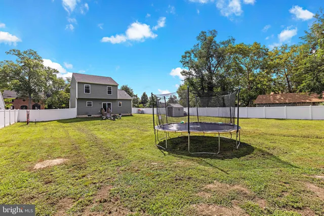 a view of a house with a big yard