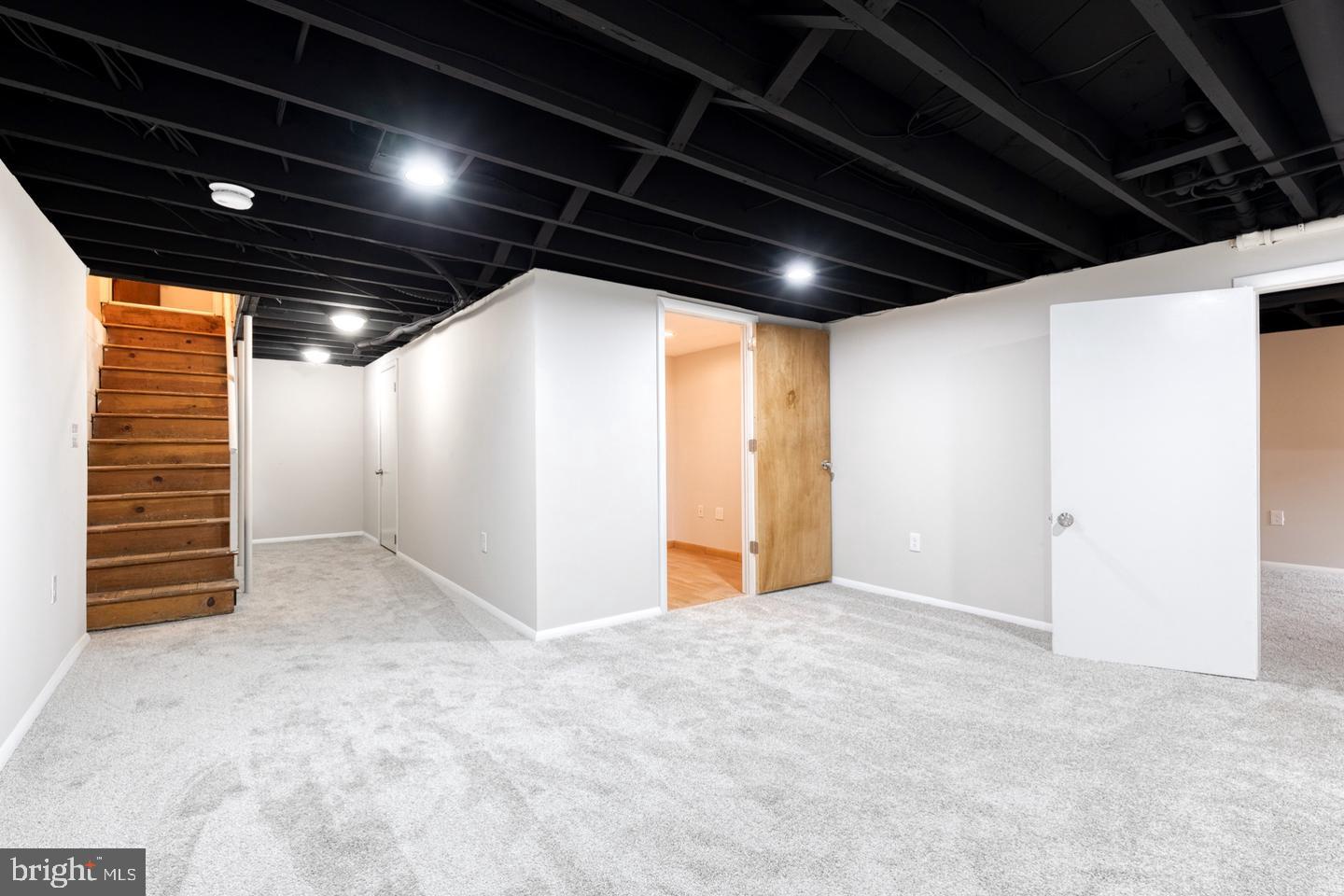 8306 Berkfield Road Baltimore, MD 21237 - Photo 18 of 29 Spacious, versatile fully finished basement.