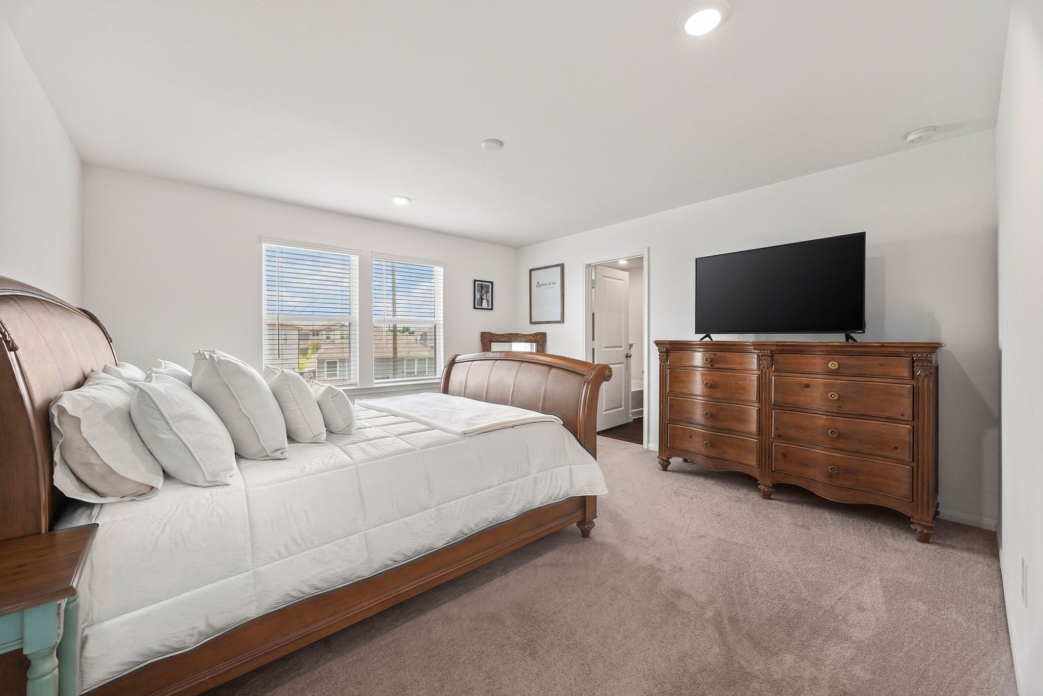 23334 Simmental Road Hockley, TX 77447 - Photo 15 of 38 Discover your inviting private primary en-suite.
