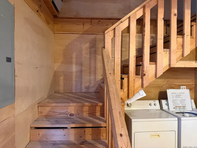 a bathroom with a sink and a shower curtain