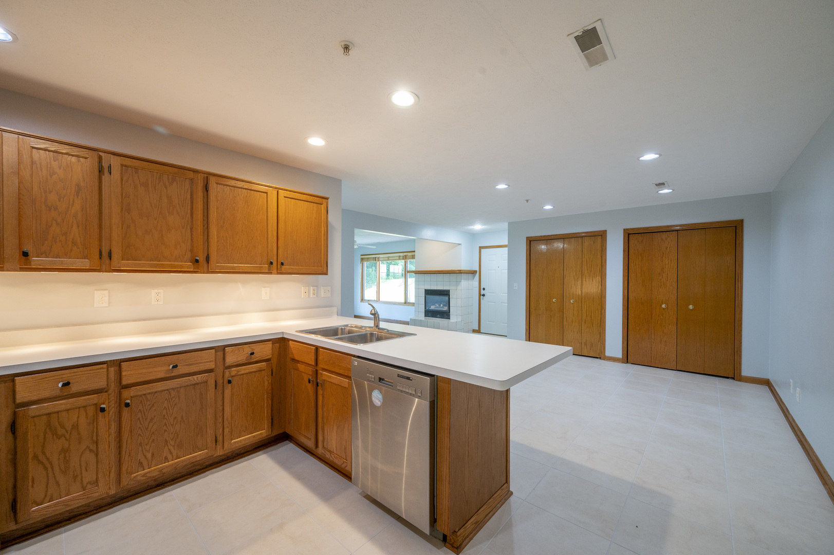 7280 North Alpine Road, Unit 4 Loves Park, IL 61111 - Photo 11 of 17 a view of a kitchen with sink cabinets and wooden floor