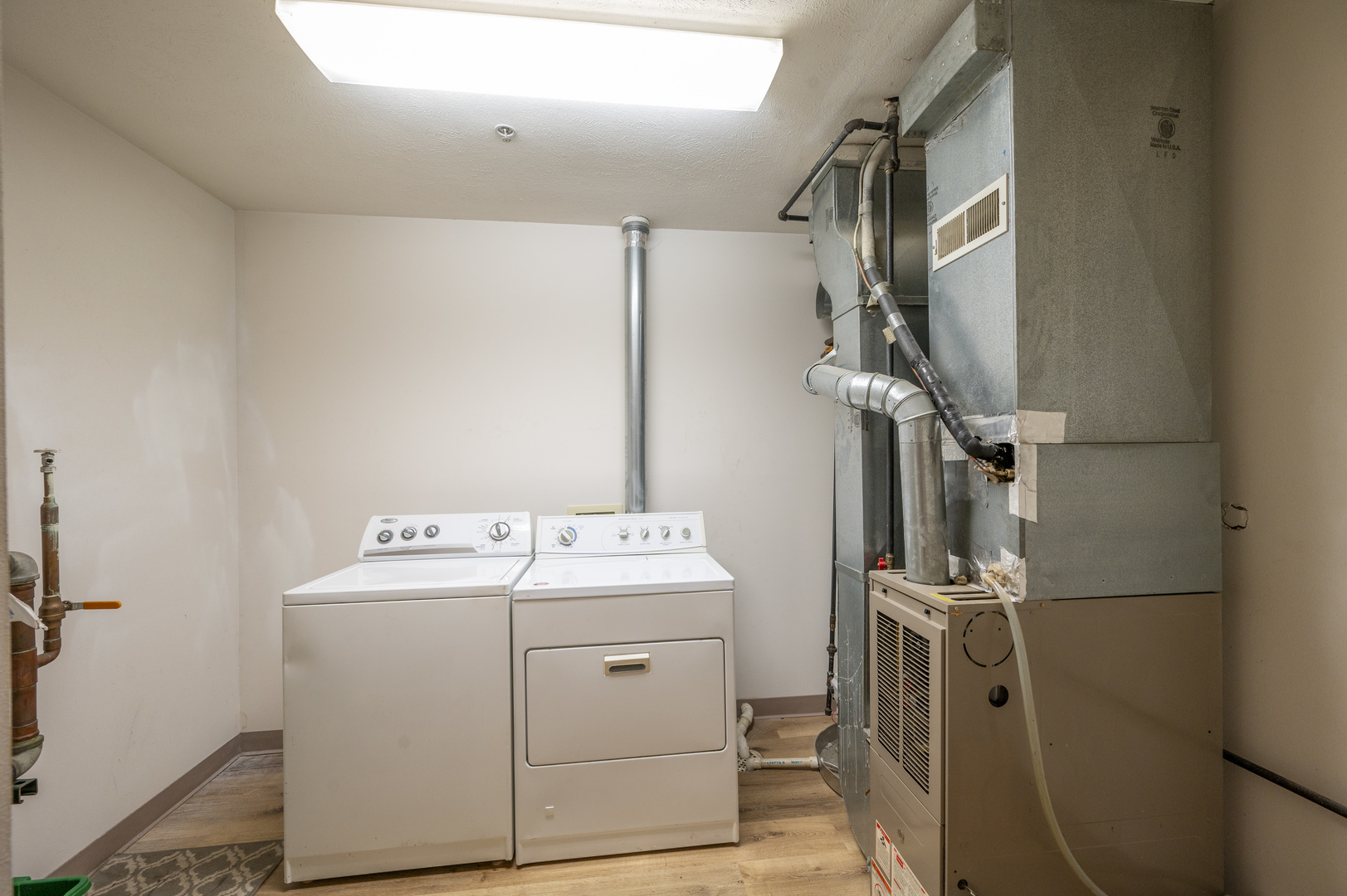7280 North Alpine Road, Unit 4 Loves Park, IL 61111 - Photo 17 of 17 a utility room with dryer and washer