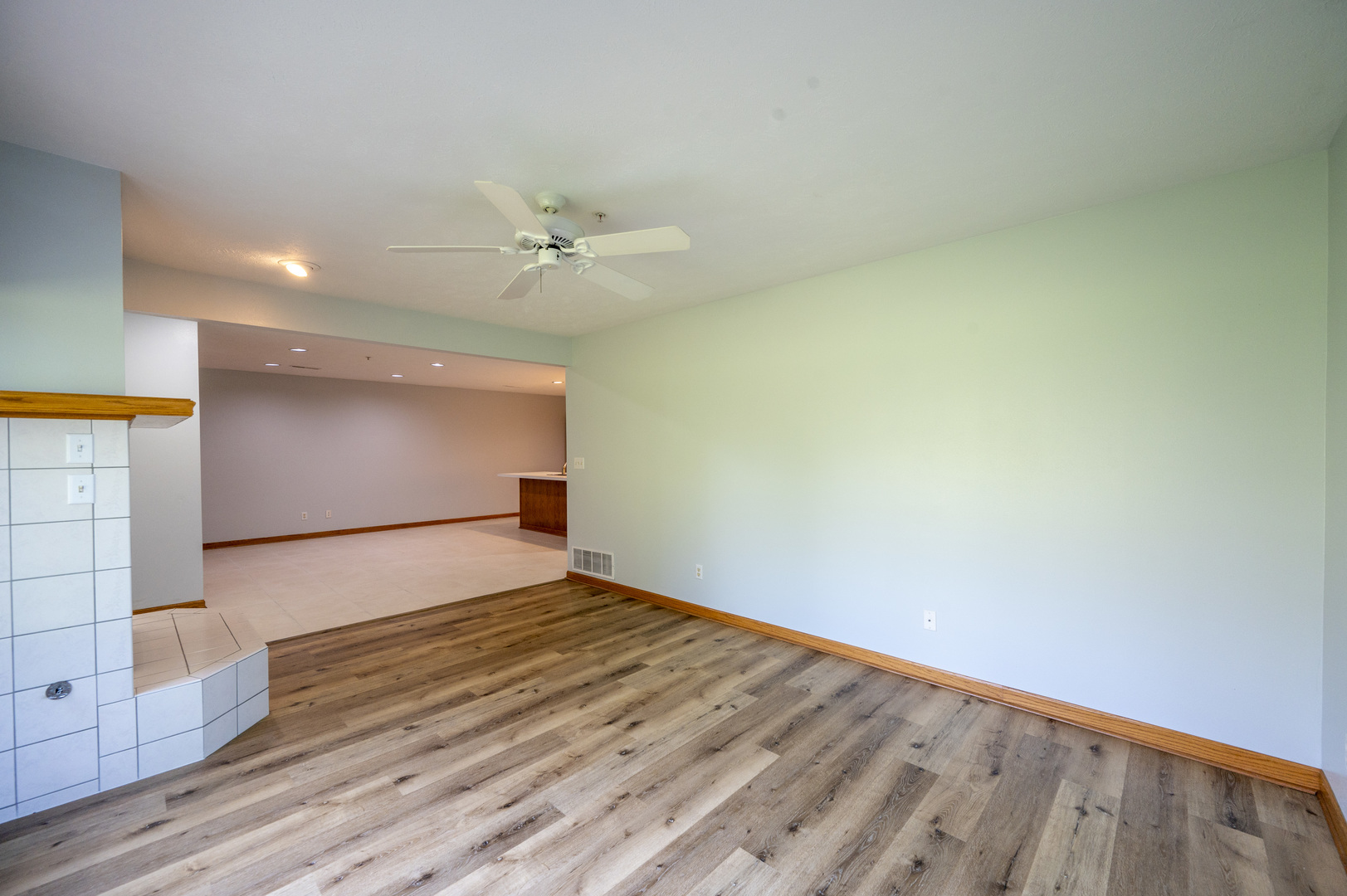 7280 North Alpine Road, Unit 4 Loves Park, IL 61111 - Photo 8 of 17 a view of empty room with wooden floor