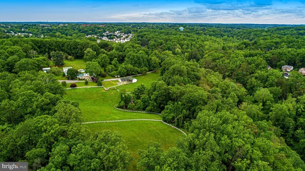 an aerial view of a golf course with a garden