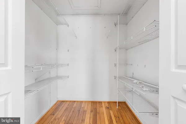 a kitchen with a sink cabinets and refrigerator