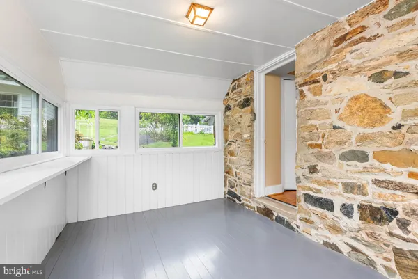 a bathroom with a shower and a toilet