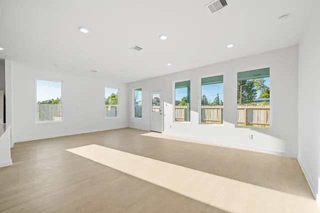 an empty room with windows