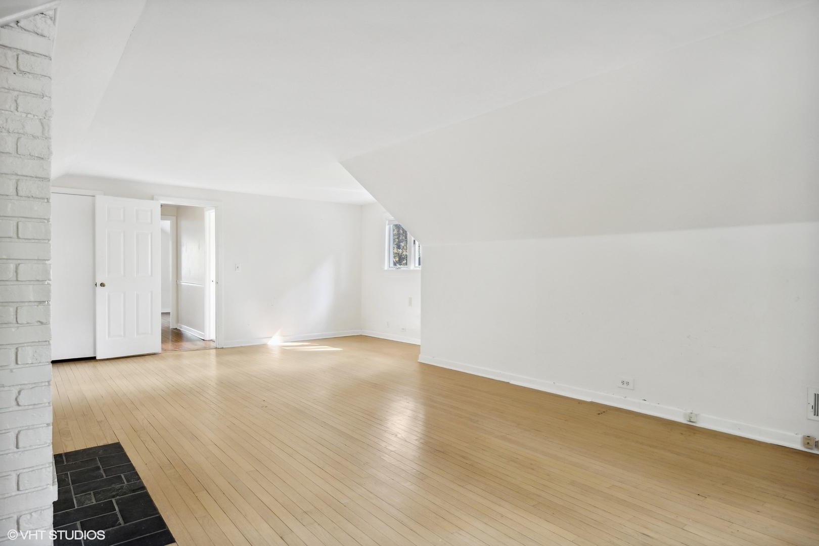 3117 Sprucewood Road Wilmette, IL 60091 - Photo 13 of 16 a view of an empty room with wooden floor