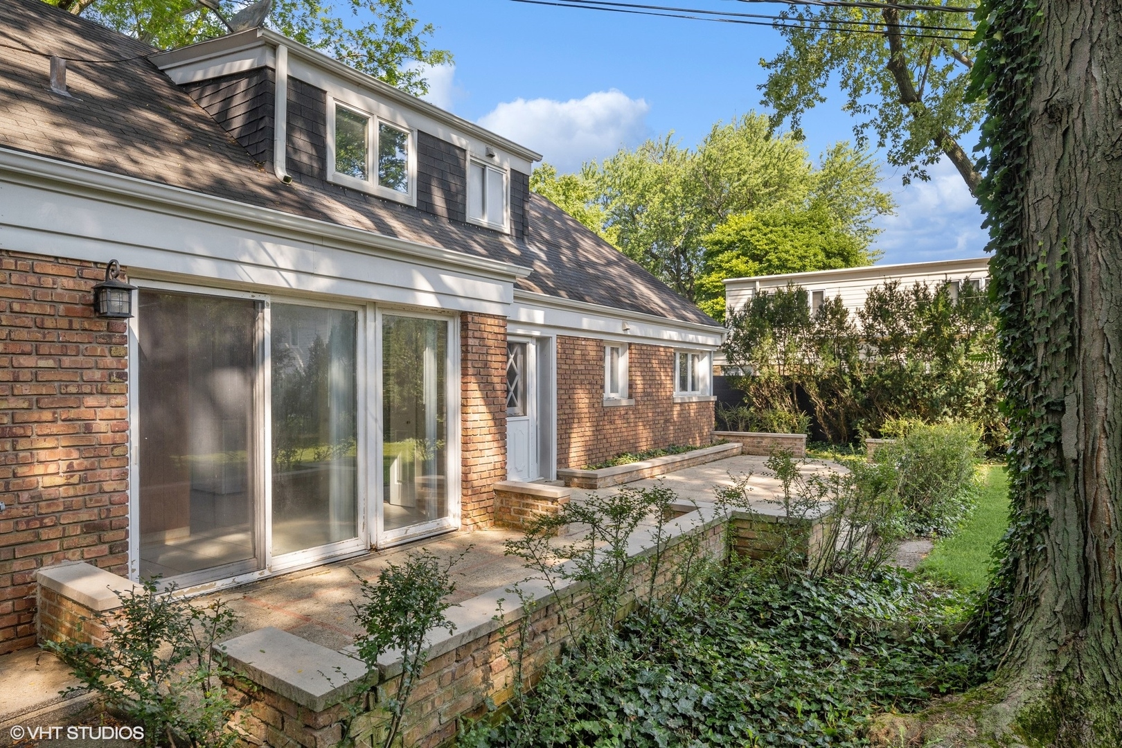3117 Sprucewood Road Wilmette, IL 60091 - Photo 14 of 16 front view of a house with a tree