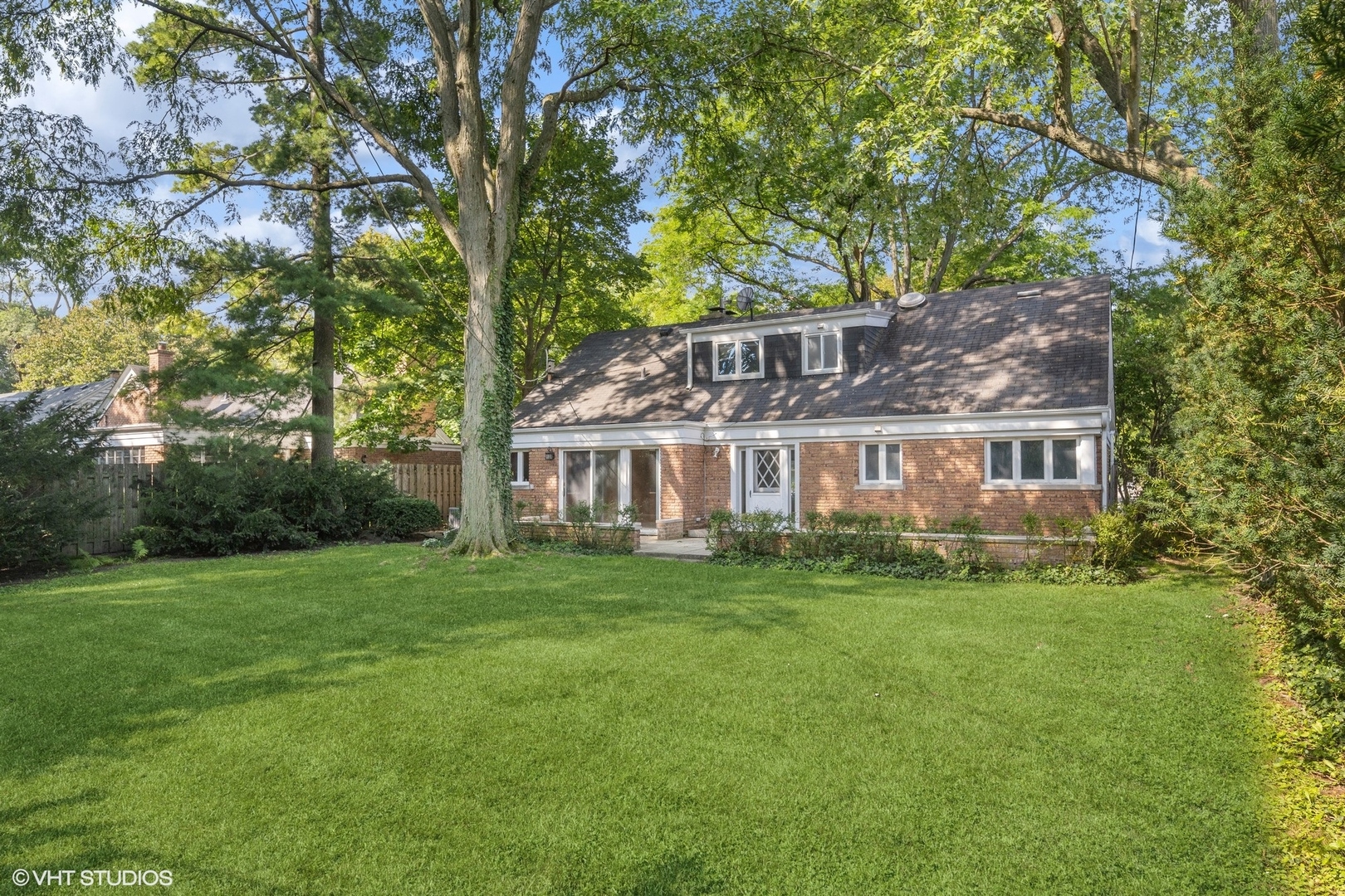 3117 Sprucewood Road Wilmette, IL 60091 - Photo 15 of 16 a view of a house with a yard