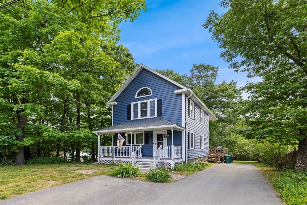 2 Allen Road Billerica, MA 01821 - Photo 2 of 32 a front view of a house with a garden and plants