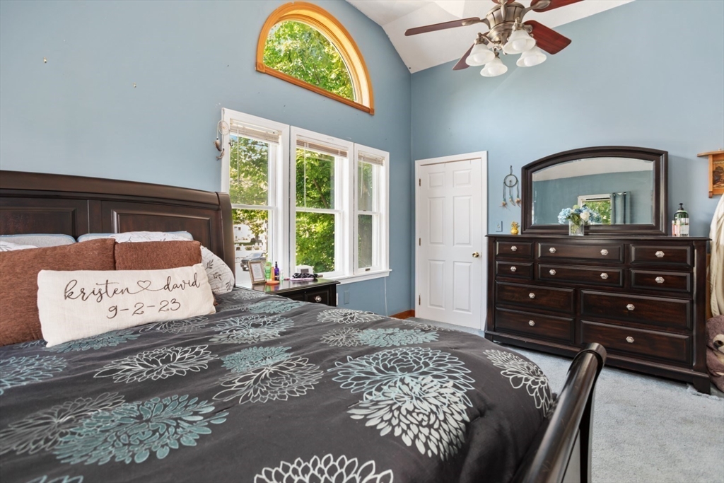 2 Allen Road Billerica, MA 01821 - Photo 22 of 32 a bedroom with a bed and a dresser