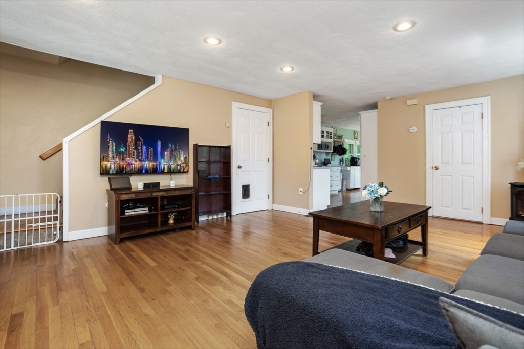 2 Allen Road Billerica, MA 01821 - Photo 7 of 32 a living room with furniture and a wooden floor
