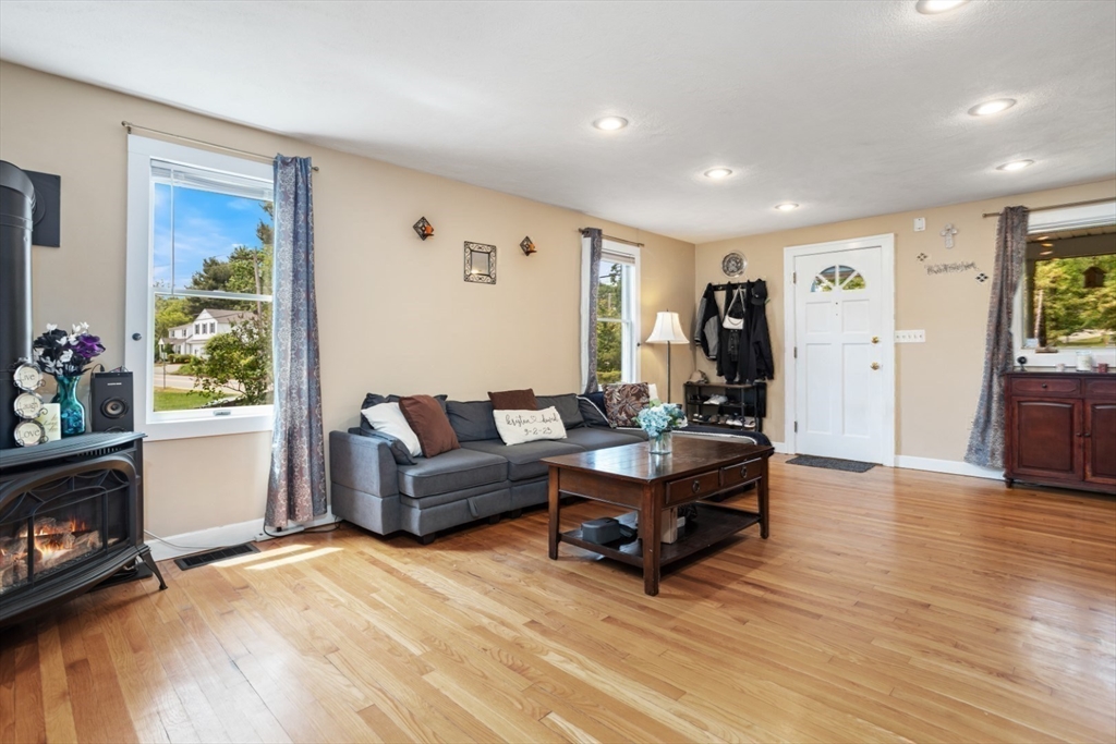 2 Allen Road Billerica, MA 01821 - Photo 9 of 32 a living room with furniture and a wooden floor