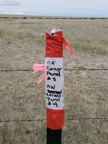 4 Judge Orr Road Calhan, CO 80808 - Photo 9 of 21 T post marking northwest corner survey marker
